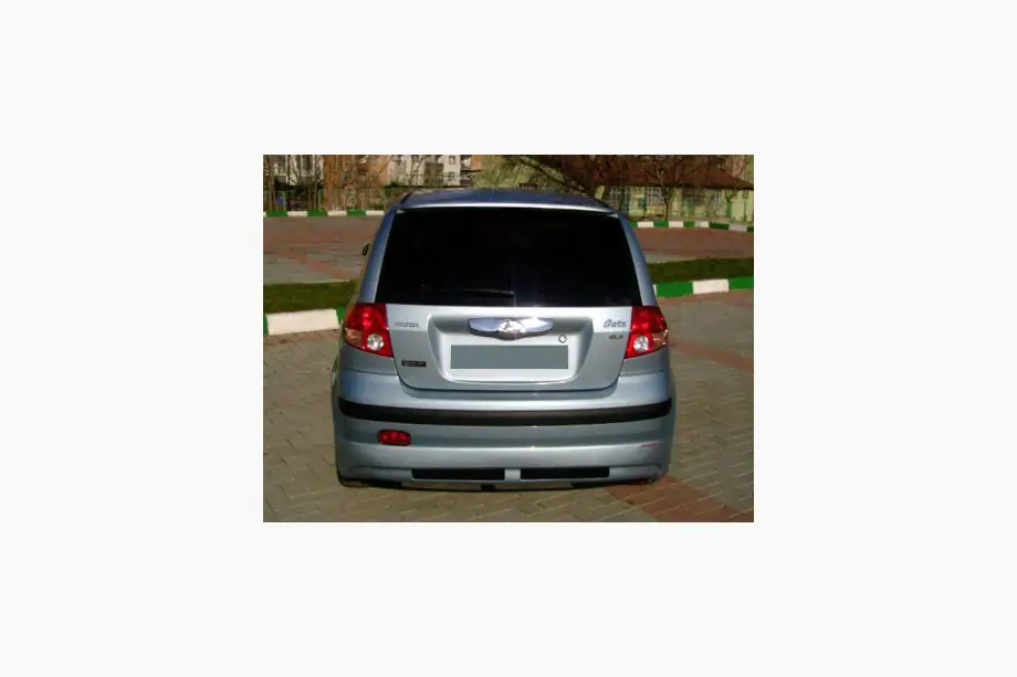 Hyundai Getz 2002- гг. Задняя нижняя накладка (грунт под покраску) Фото 1