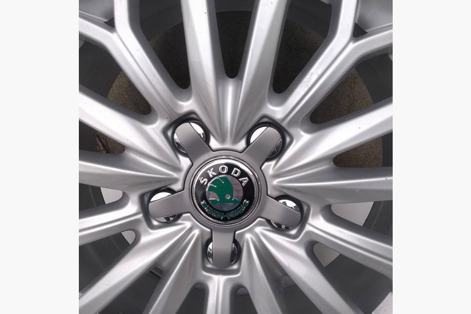 Skoda Наклейки на диски 56мм J1009 (4 шт) Image