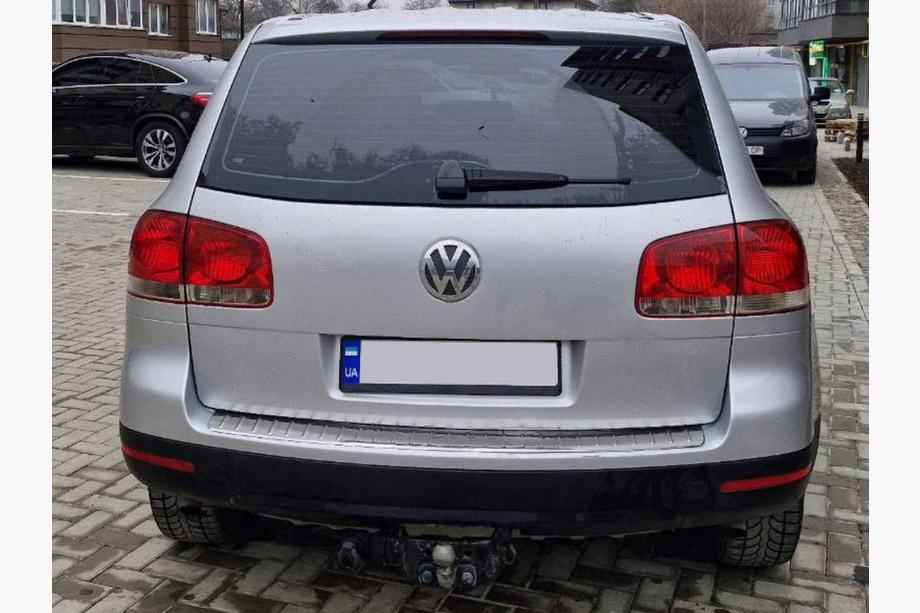 Volkswagen Touareg 2002–2010 гг. Накладка на задний бампер Carmos нержавейка Image