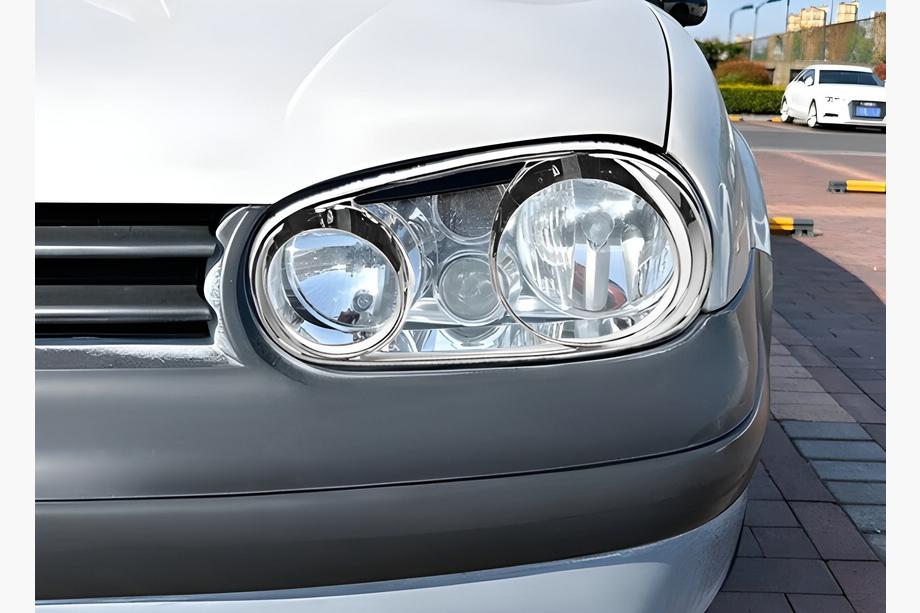 Volkswagen Golf 4 1997-2006 гг. Накладки на фары Очки V2 (2 шт., пластик) Image
