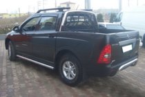 SsangYong Action 2005-2018 гг. Боковые трубы (2 шт., нержавейка) фото 2