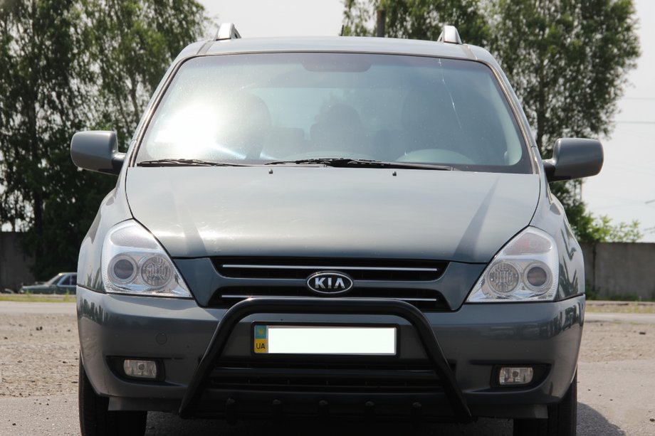 Kia Carnival 2002-2013 гг. Кенгурятник WT003 Черный Нержавейка Image