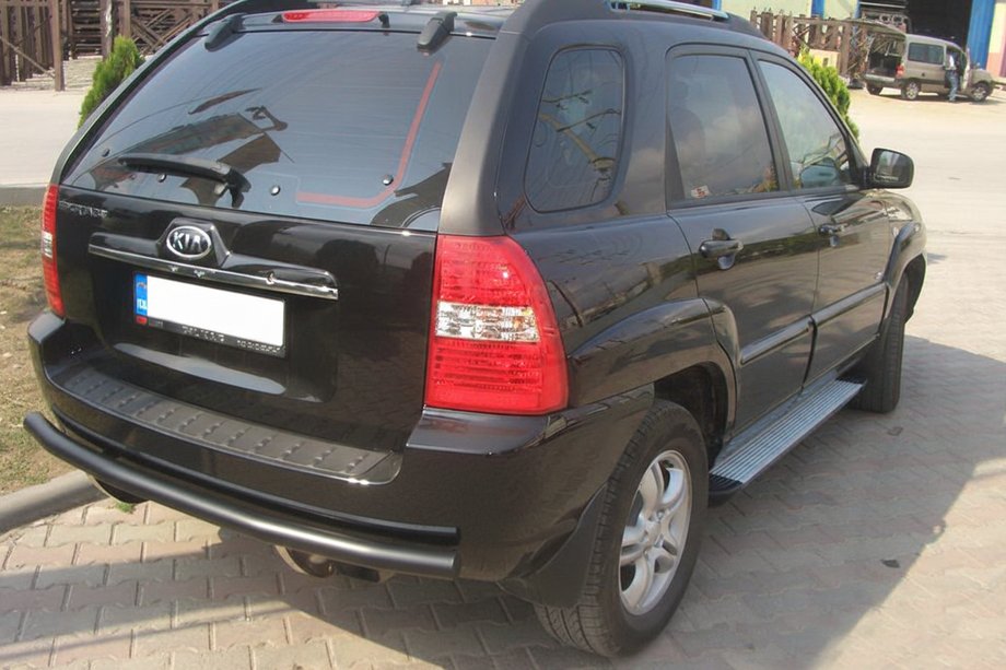 Kia Sportage 2004-2010 гг. Задняя дуга AK002 Черная (нерж.) Фото 2