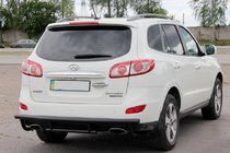Hyundai Santa Fe 2 2006-2012 гг. Задняя дуга AK002-2 Черная (Нержавеющая сталь) фото 4