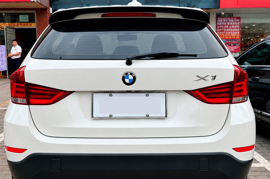 BMW X1 E84 2009-2015 гг. Спойлер DPT M-Style (черный глянец) Image