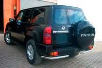 Nissan Patrol Y61 1997-2011 гг. Задние угловые дуги AK003 (2 шт, нержавейка) фото 1