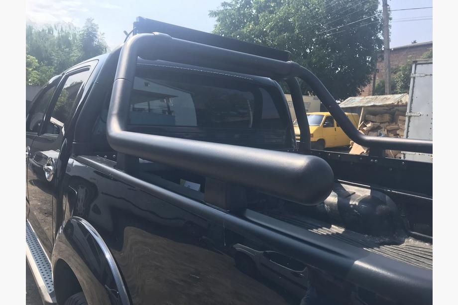 Toyota Hilux 2006-2015 гг. Дуга на кузов (черная) 76мм Фото 4