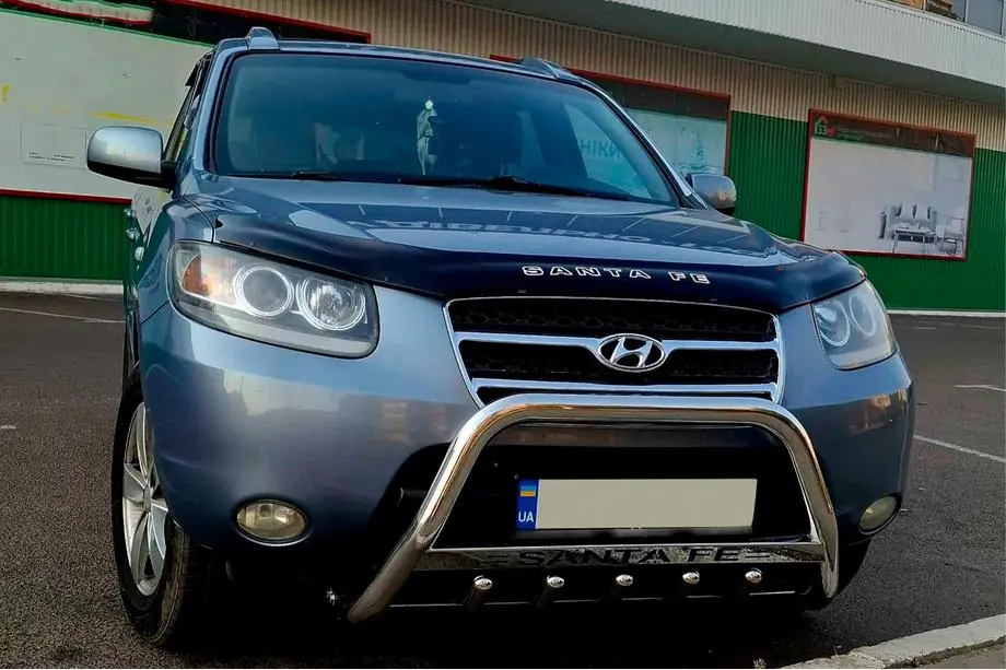 Hyundai Santa Fe 2 2006-2012 гг. Кенгурятник WT004 (нержавейка) Image