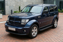Dodge Nitro 2006-2011 гг. Боковые Подножки Tayga Black (2 шт., Алюминий) фото 1