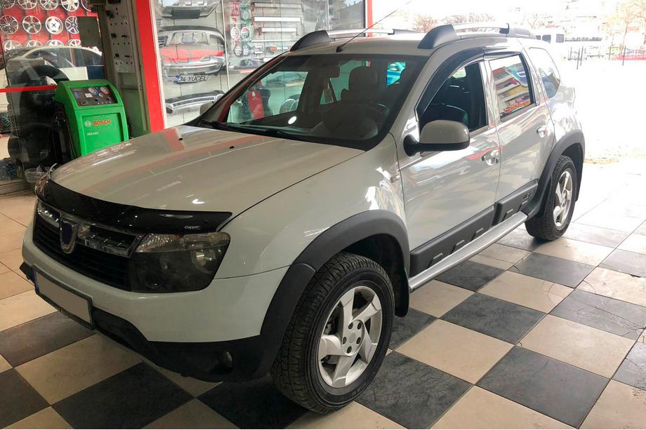 Dacia Duster 2008-2018 гг. Гладкие накладки на арки (8 шт, пластиковые) Фото 9