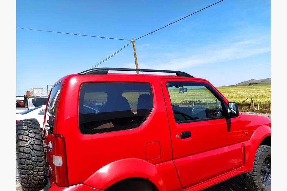 Suzuki Jimny 1998-2018 гг. Рейлинги Skyport (черные) Фото 1