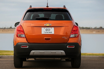 Chevrolet Trax 2012-2023 гг. Накладки на задние противотуманные фары 2013-2016 (2 шт, ABS) фото 1